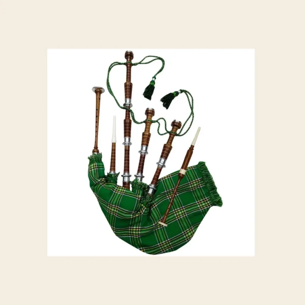 traditional scottish bagpiper in kilt